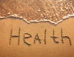 health written in sand on beach