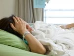 frustrated woman in hospital bed